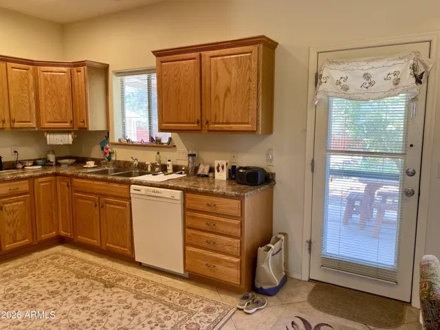 Kitchen / Back Door to Backyard Covered Patio