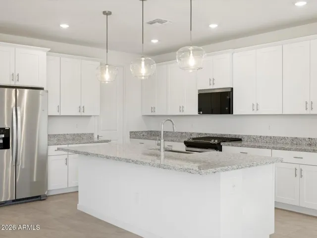 Photo is not of the actual home. Interior finishes and fixtures may vary.