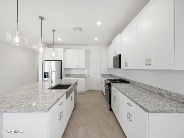 Photo is not of the actual home. Interior finishes and fixtures may vary.