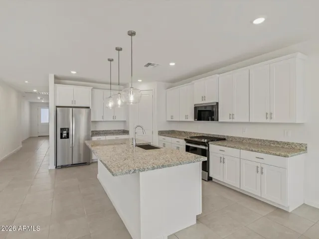 Photo is not of the actual home. Interior finishes and fixtures may vary.