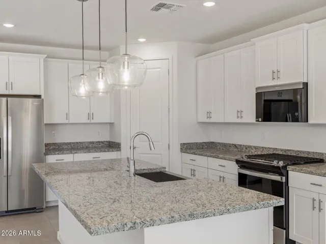 Photo is not of the actual home. Interior finishes and fixtures may vary.