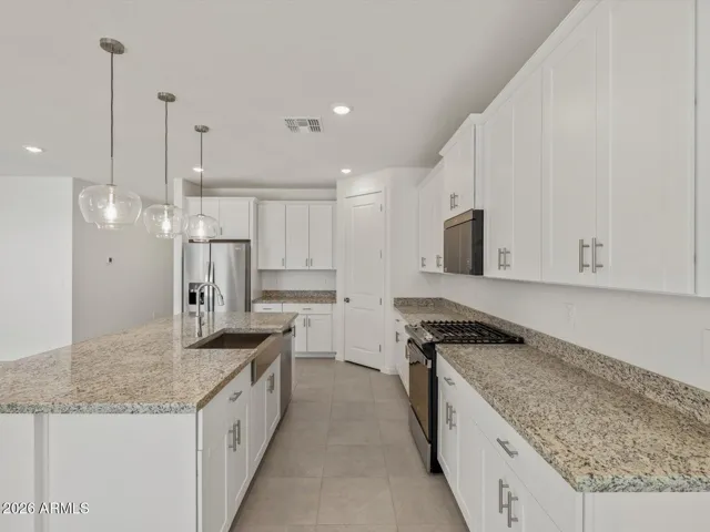 Photo is not of the actual home. Interior finishes and fixtures may vary.