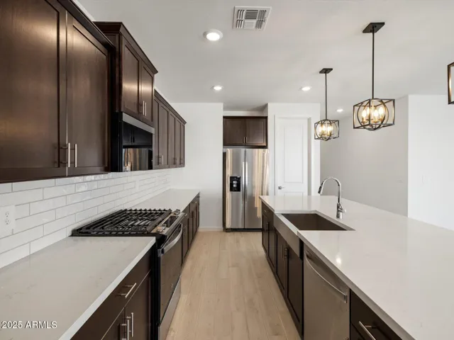 Photo is not of the actual home. Interior finishes and fixtures may vary.