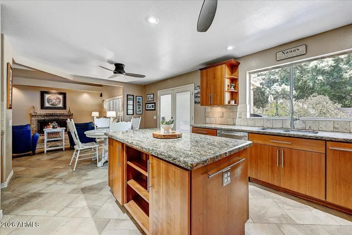 The large kitchen with island has plenty of creative and smart storage options.
