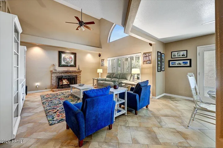 View from Kitchen to family room and cozy fireplace