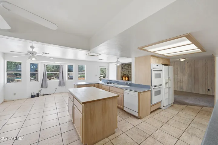 Huge entertaining kitchen with bay window to the backyard.a