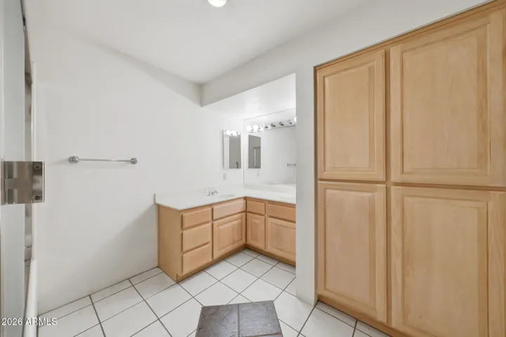 Hall Bathroom - very large footprint with lots of storage.