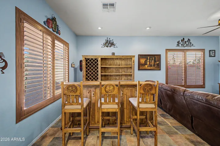 ADDITIONAL LIVING ROOM WITH BAR