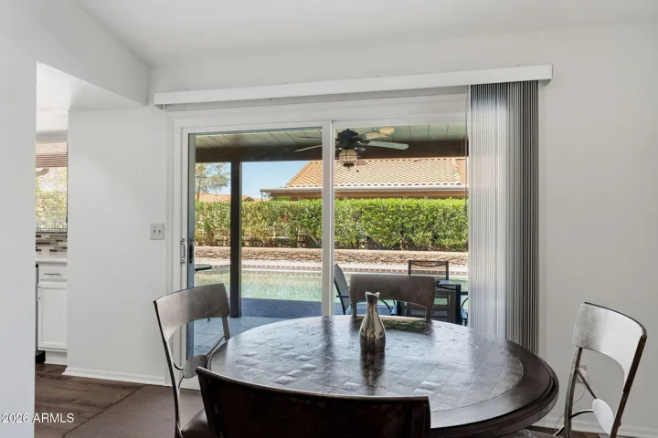 Kitchen eating area looking to the pool.