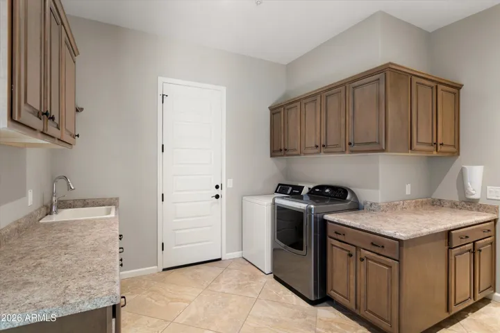 WASHER & DRYER THAT CONVEY. SINK IS HANDY UPGRADE.