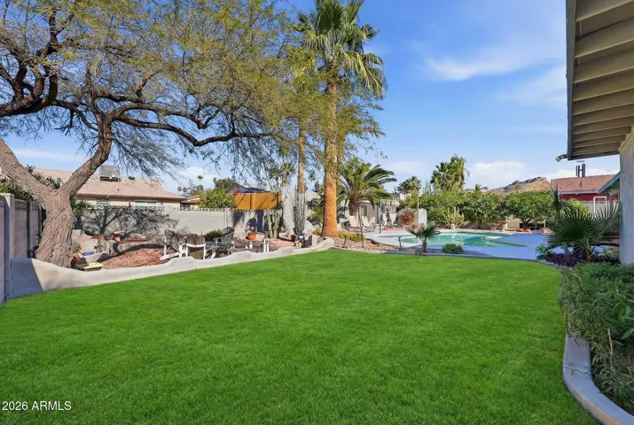 Grassy grounds offering space for play, pets, and relaxation