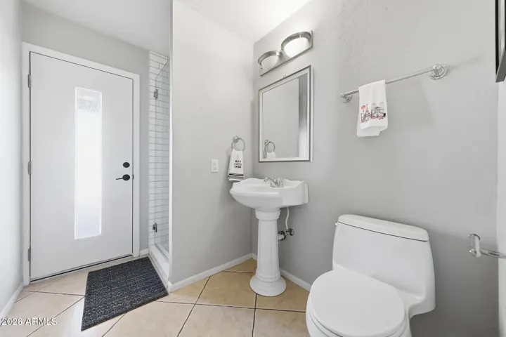 With shower and direct access to backyard desert oasis