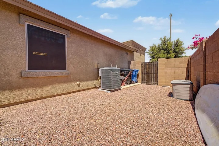 Spacious side yard for storage.
