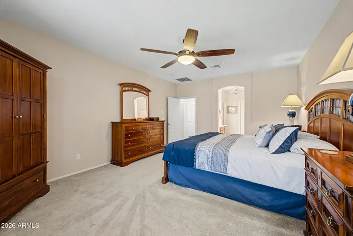 The primary bedroom is connected to an ensuite bathroom.