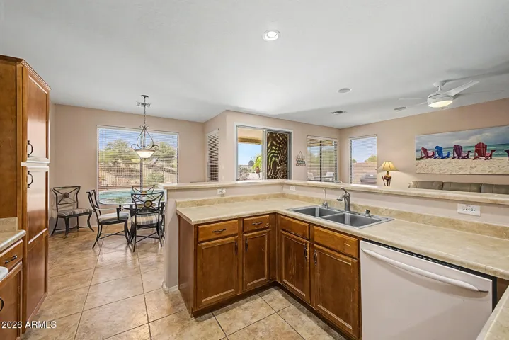 A panoramic view of the kitchen, showcasing all its areas.
