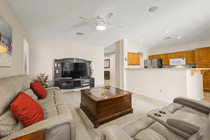 This spacious great room offers ample room for a large TV and entertainment setup.