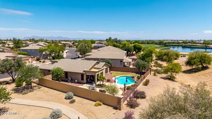 The premium corner lot is conveniently located next to the walk path and is only bordered by one neighbor on one side.