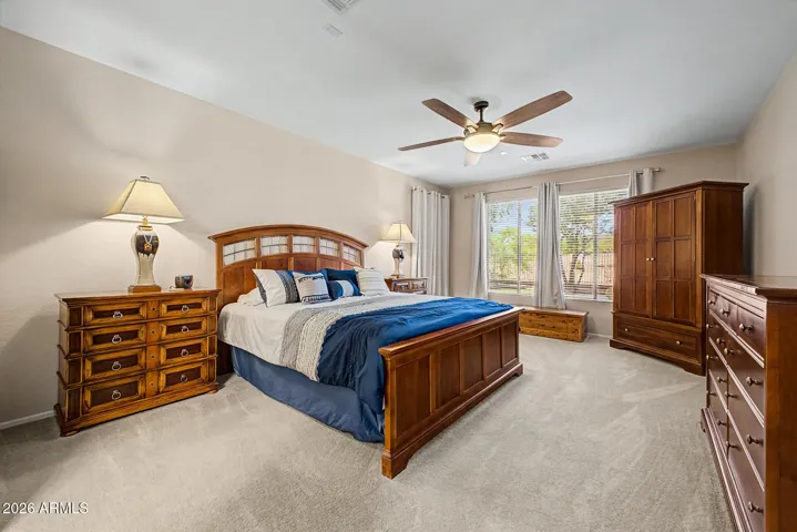 The primary bedroom has an extension, creating a spacious area for your relaxing retreat.