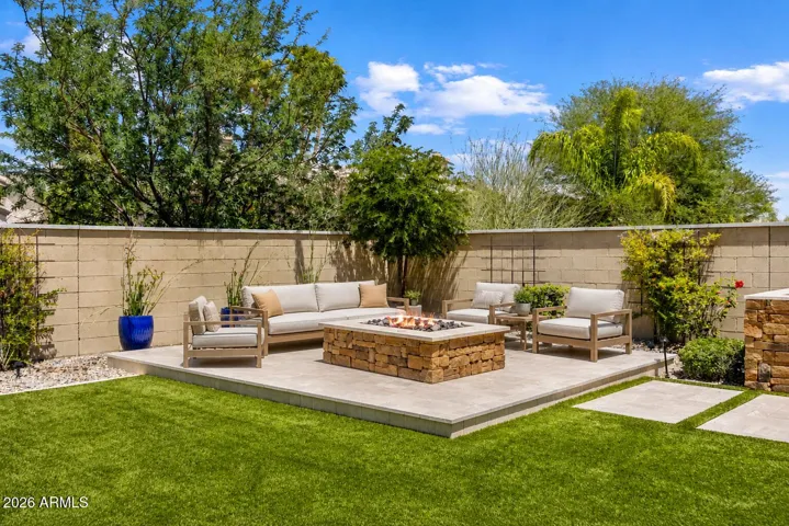Gather around a custom stone fire pit