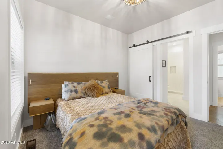 Secondary ensuite bedroom located on main floor.