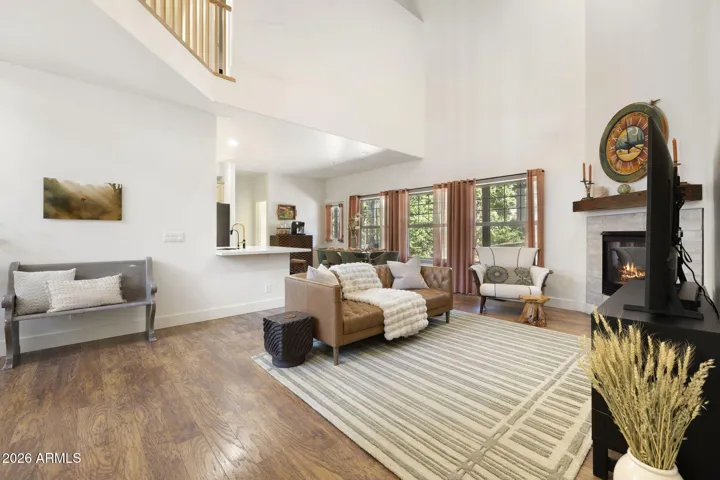 Open area to dining and kitchen island.