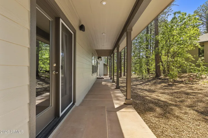 Rear patio with refreshed backyard. Possible patio expansion opportunity with DRC approval.