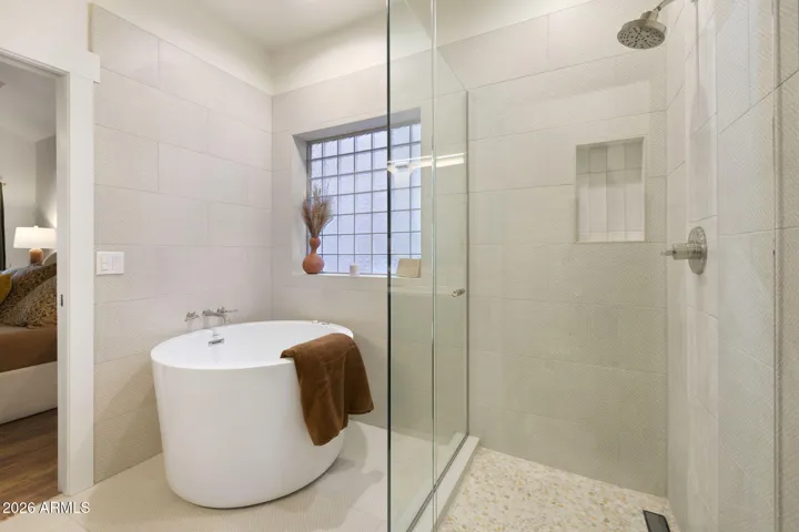 Recently remodeled Primary bathroom with new cabinets and dual sinks.