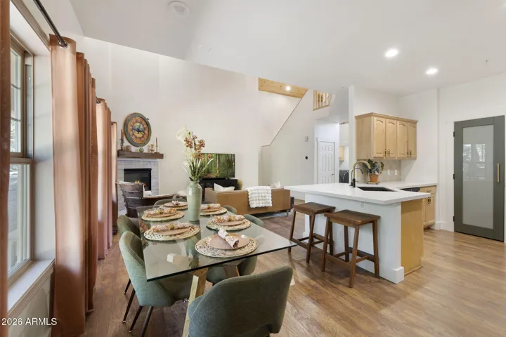 Dining with additional seating at the kitchen island.