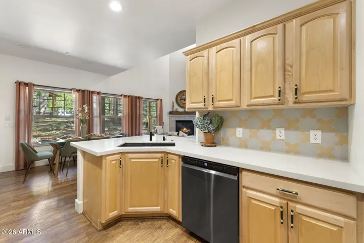 Spacious kitchen with updated countertops.