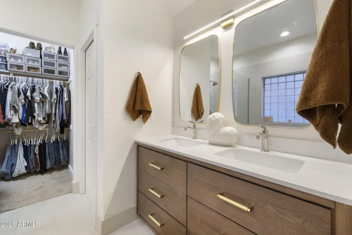 Recently remodeled Primary bathroom with new cabinets and dual sinks.