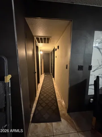 Hallway Leading to 3 Bedrooms Incl. Master
