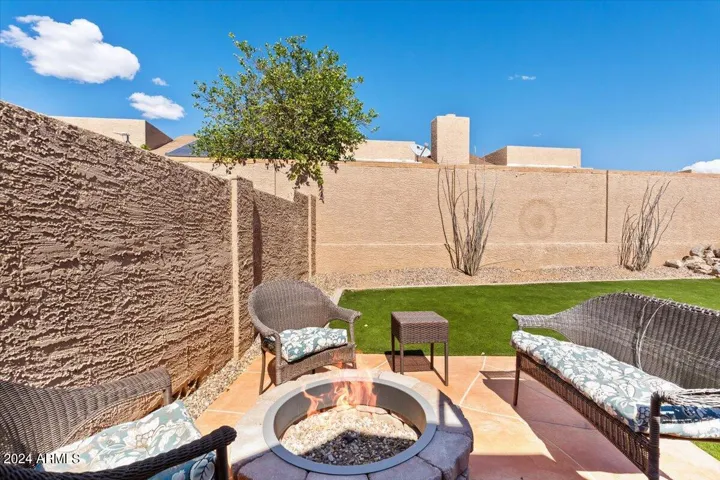 Backyard fire pit seating area ideal for Arizona evenings and outdoor entertaining