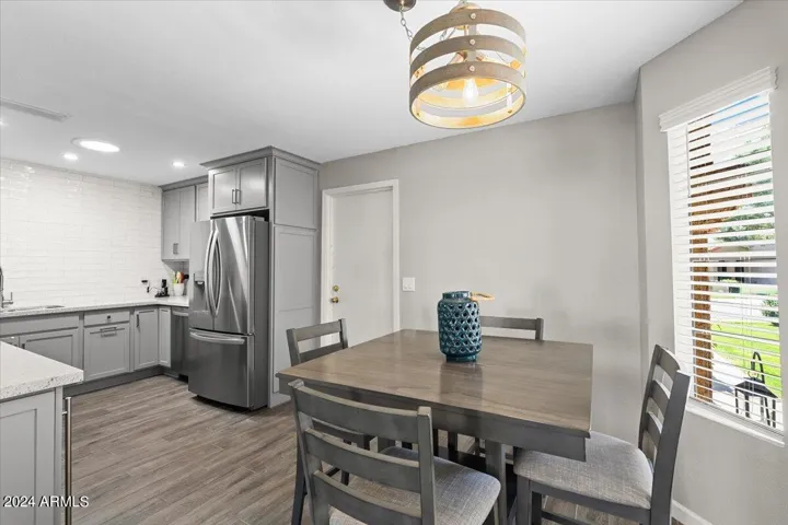 Dining area bathed in natural light, ideal for everyday meals or entertaining