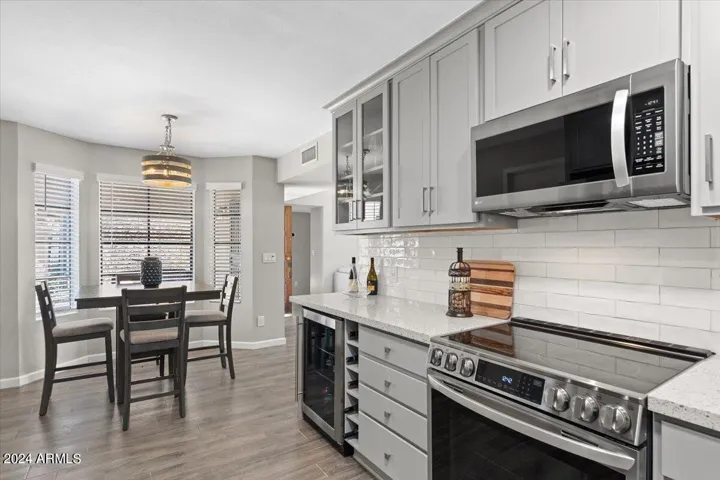 Another view of the beautifully refreshed kitchen with clean lines and skylight