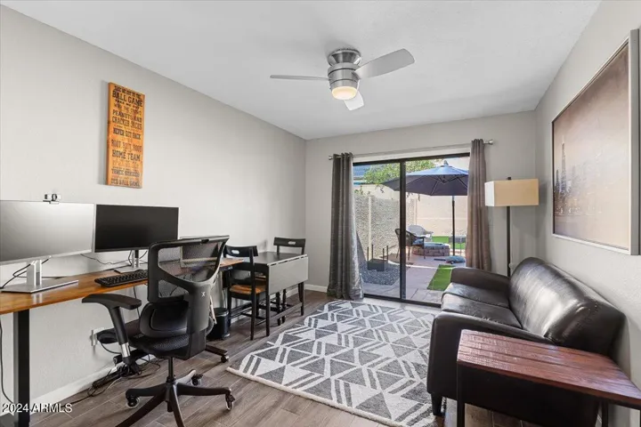 Bright guest bedroom with sliding doors and direct patio access