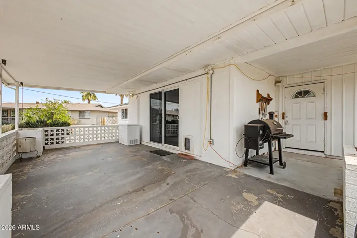 This spacious covered patio extends the living space outdoors, offering a shaded spot to relax, enjoy your morning coffee, or visit with friends. With plenty of room for seating and easy-care surroundings, it’s a comfortable space to enjoy the Arizona lifestyle.