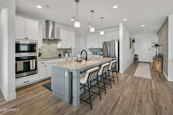 Stainless steel appliances, granite countertops, built in oven, chef's dream!