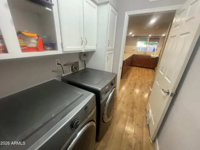 Laundry Room with a view of the kitchen