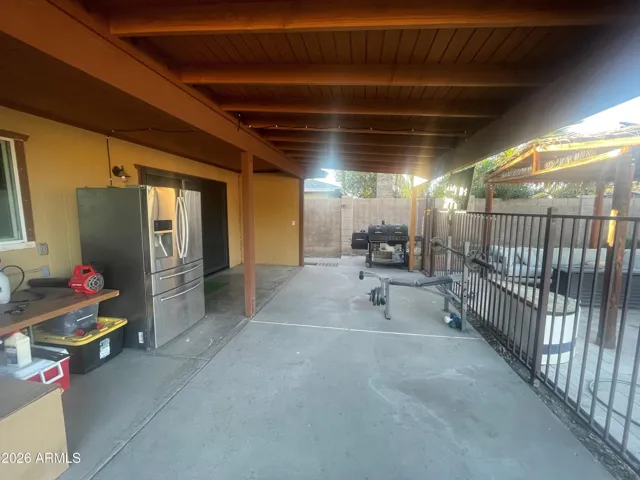 Backyard - Nice, large covered patio!