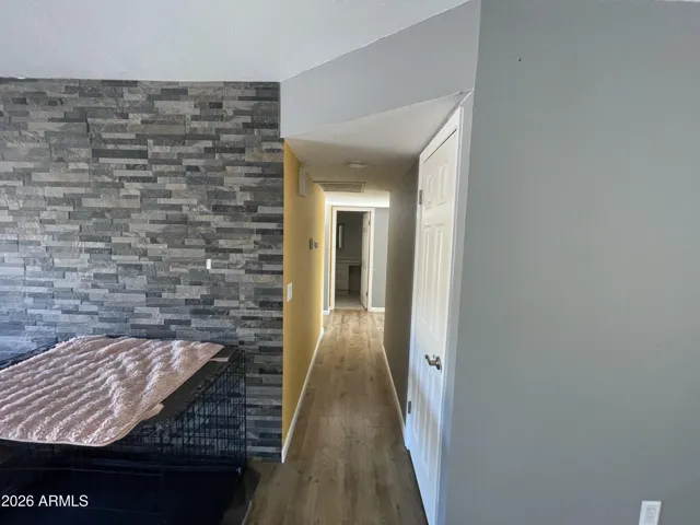 Hallway leading to 3 bedrooms