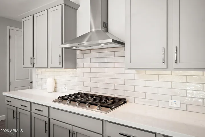 Gas cooktop and quartz countertops