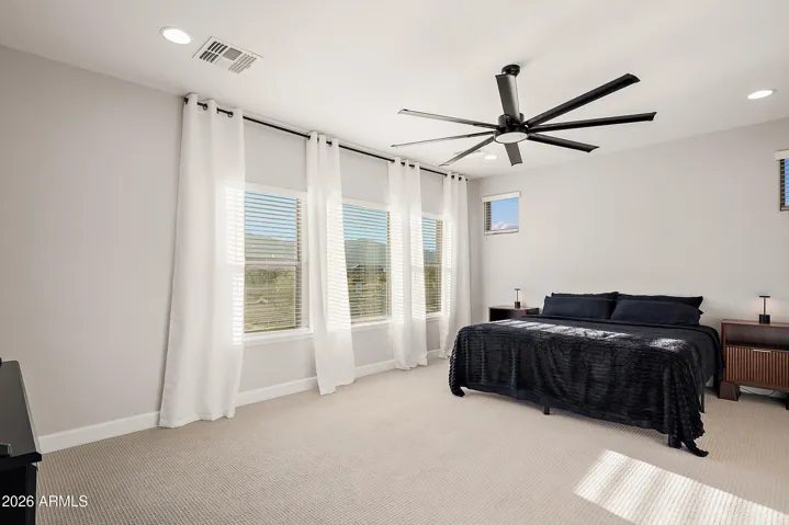Primary flooded with natural light and mountain views!