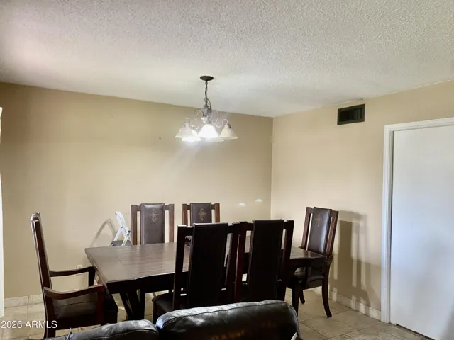 Formal dining area in front living room