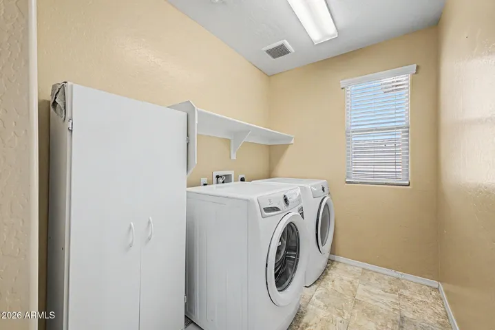 Upstairs Laundry with New Washer and Dryer