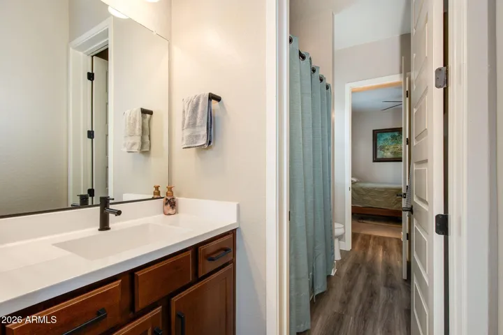 Jack and Jill bathroom. Each room has it's own sink and direct access to the shared tub and toilet.