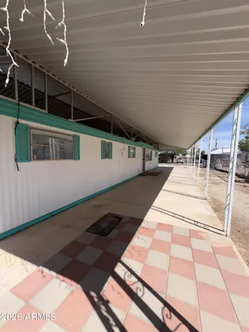 Large covered patio off front door