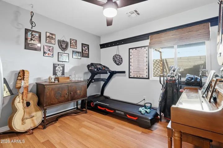 This bedroom is located by the laundry & guest bath.