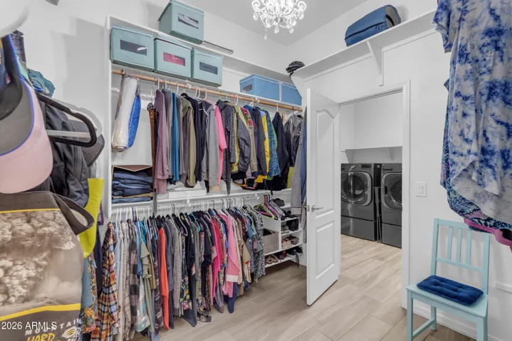 Owners Suite Closet Opens into Laundry Room