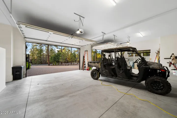 Plenty of room for cars, toys, storage & workshop in garage