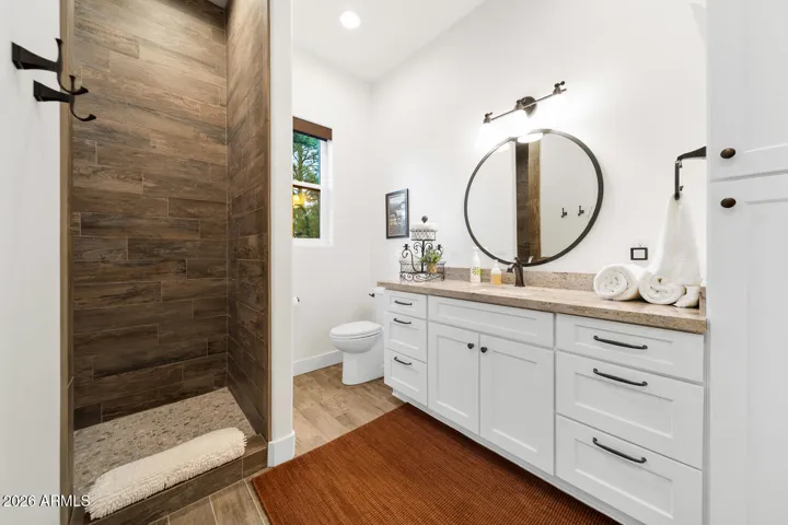 Guest suite 3 bathroom with walk-in tile shower